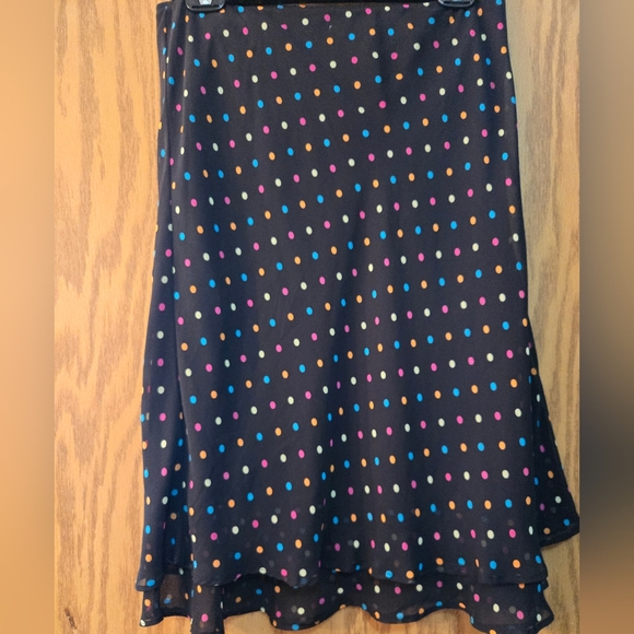 Very cute black skirt with multi colored dots on the sheer overlay. Size 6. - Picture 4 of 5